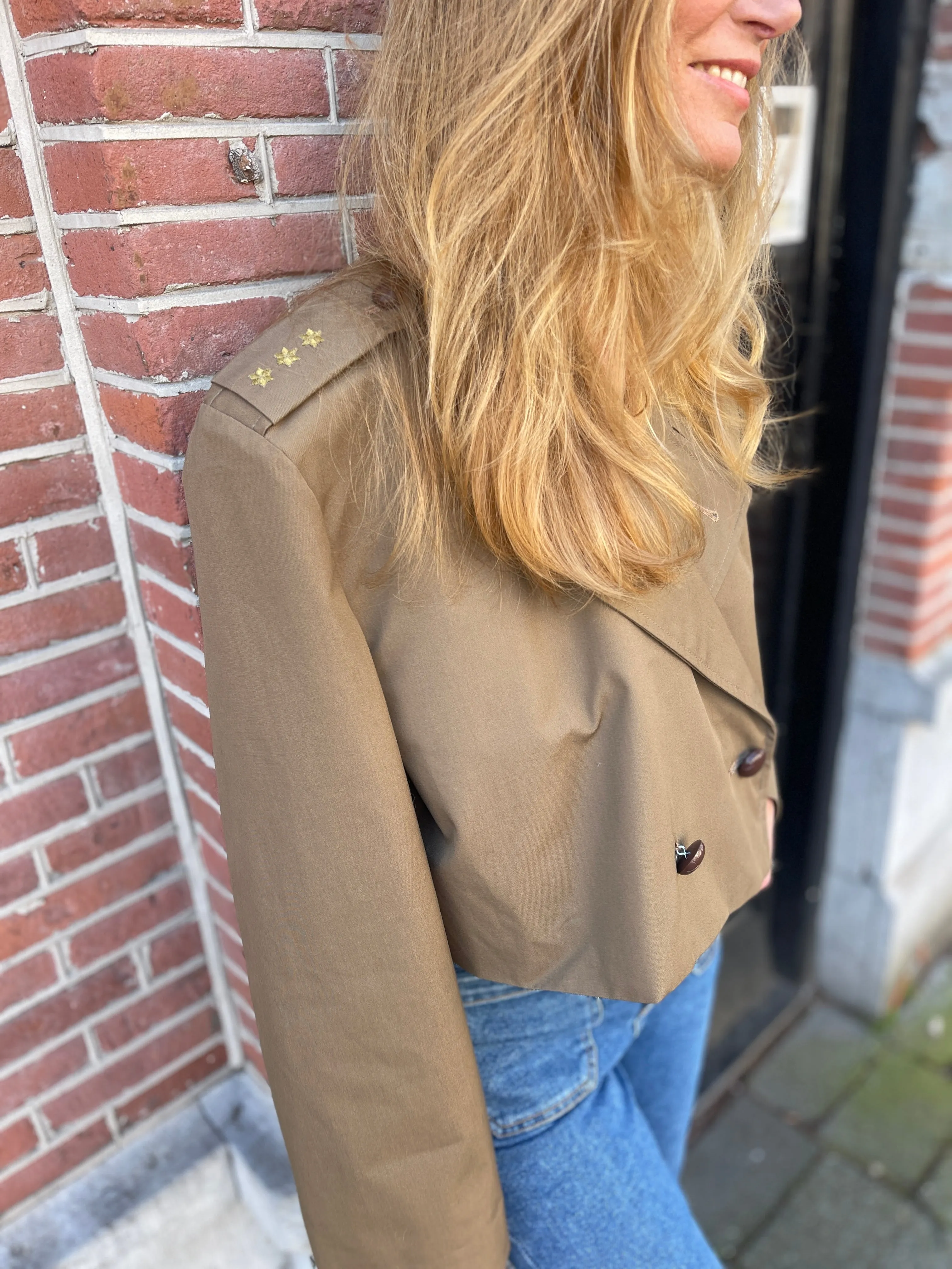 Cropped trench coat.