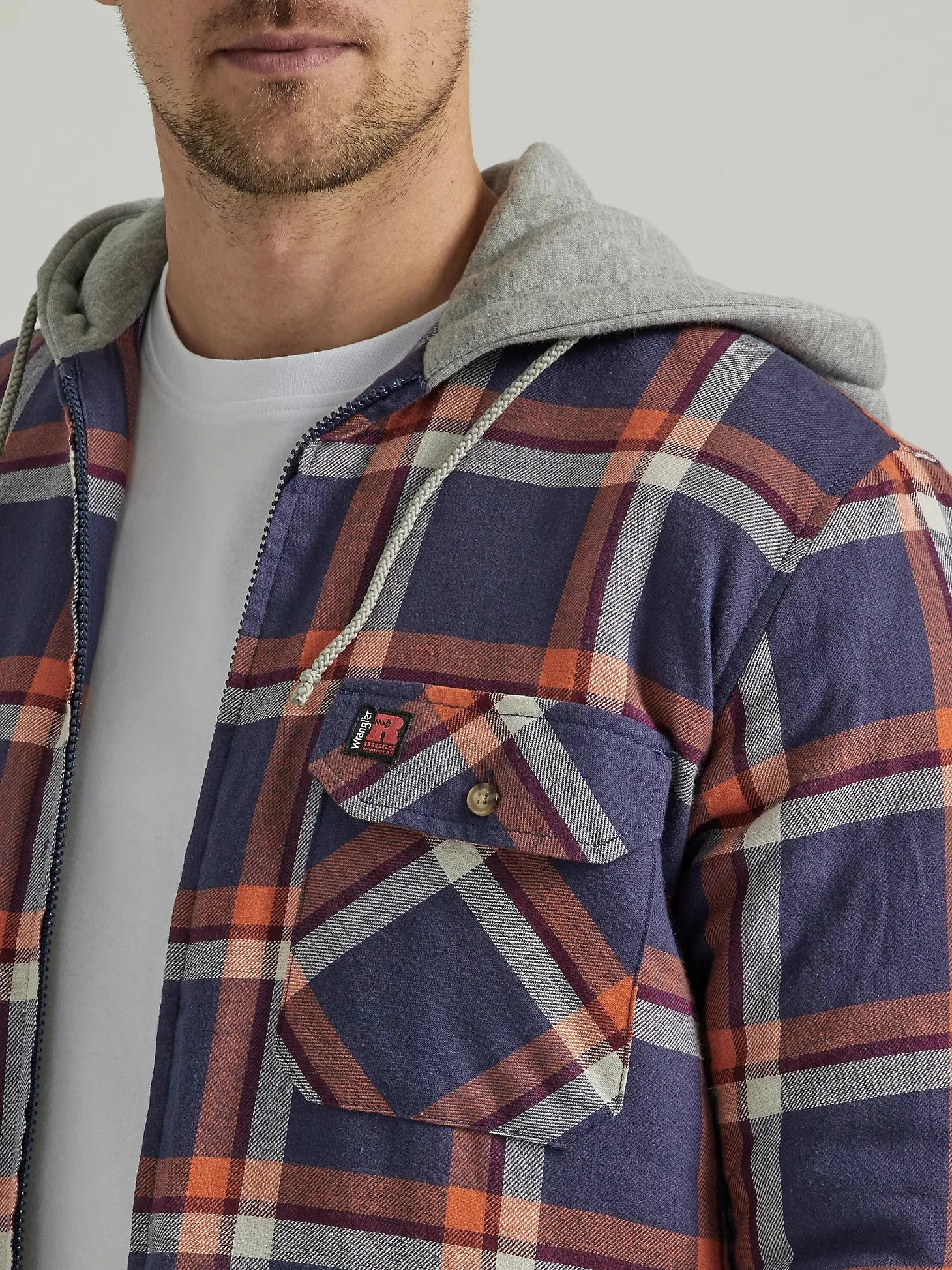 WRANGLER® RIGGS WORKWEAR® LONG SLEEVE HOODED FLANNEL WORK JACKET IN NAVY ORANGE